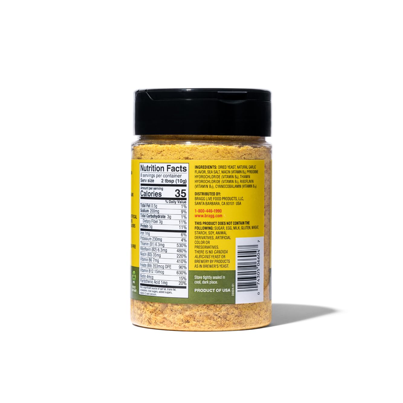 Lifestyle kitchen scene with Bragg seasoning used on salads and roasted vegetables