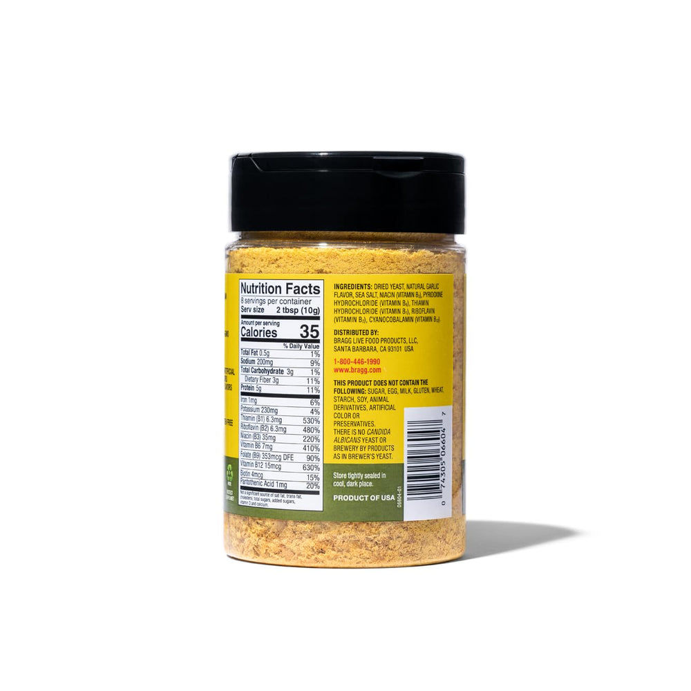 Lifestyle kitchen scene with Bragg seasoning used on salads and roasted vegetables