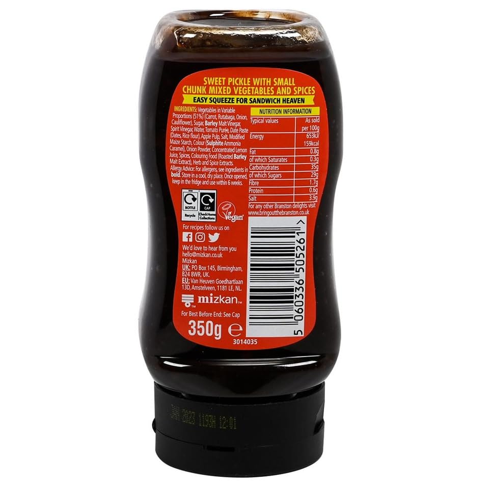 Hand squeezing Branston bottle onto bread, Branston makes sandwich prep tidy