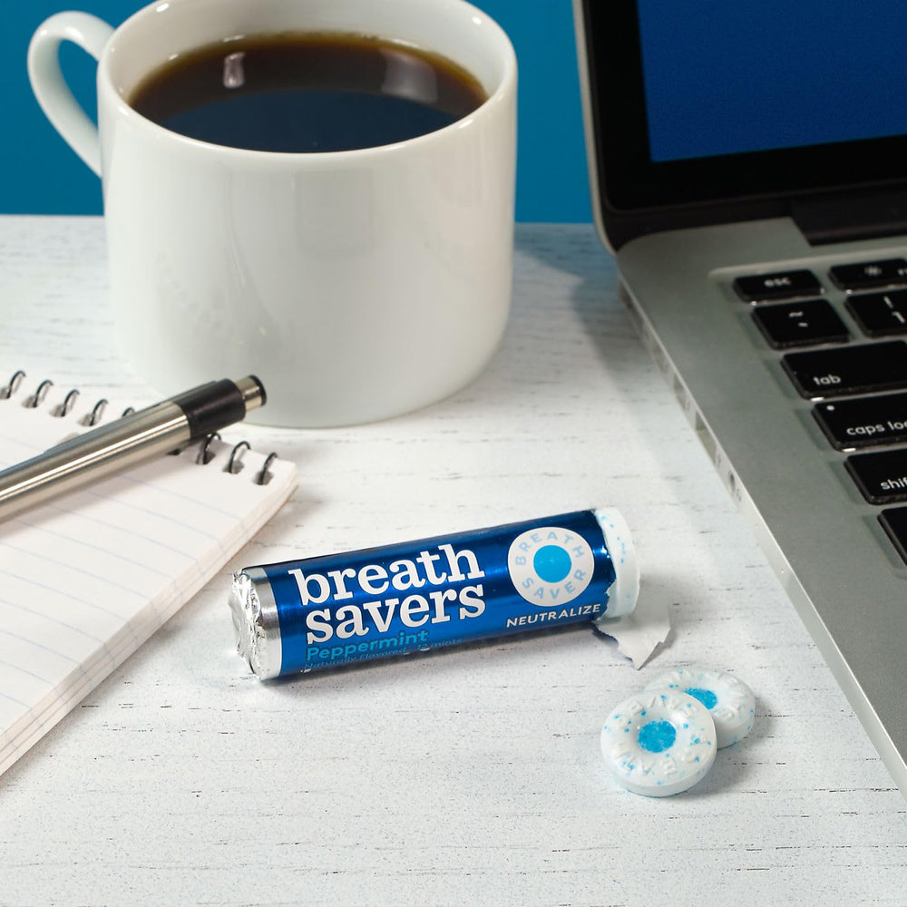 Breath Savers roll tucked inside a pocket showing easy portability and on-the-go access