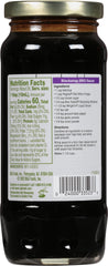 Brer Rabbit molasses on spoon, shows thickness and portion control for recipes