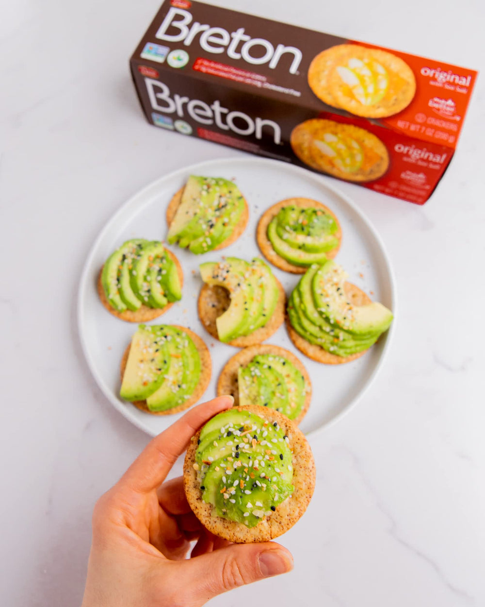 Breton open inner bag revealing crisp crackers ready to serve and stay fresh longer