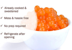 BREXONIC mango popping boba close-up showing glossy texture and fruity bursts