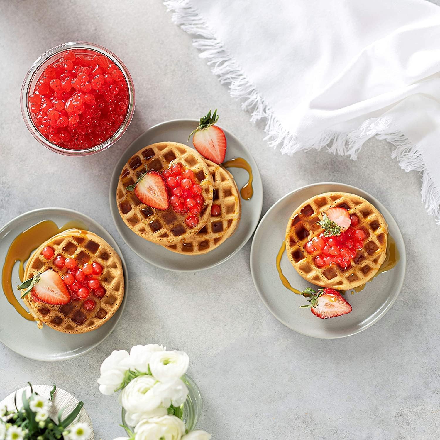 BREXONIC popping boba served in glass bubble tea, enhances drink texture and fun