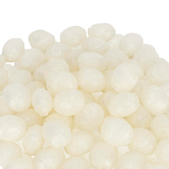 Brioschi candies staged on a spring table suggesting refreshing citrus enjoyment