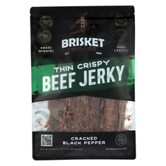 Brisket Chips Co. front packaging showing 8oz bag and cracked black pepper benefit