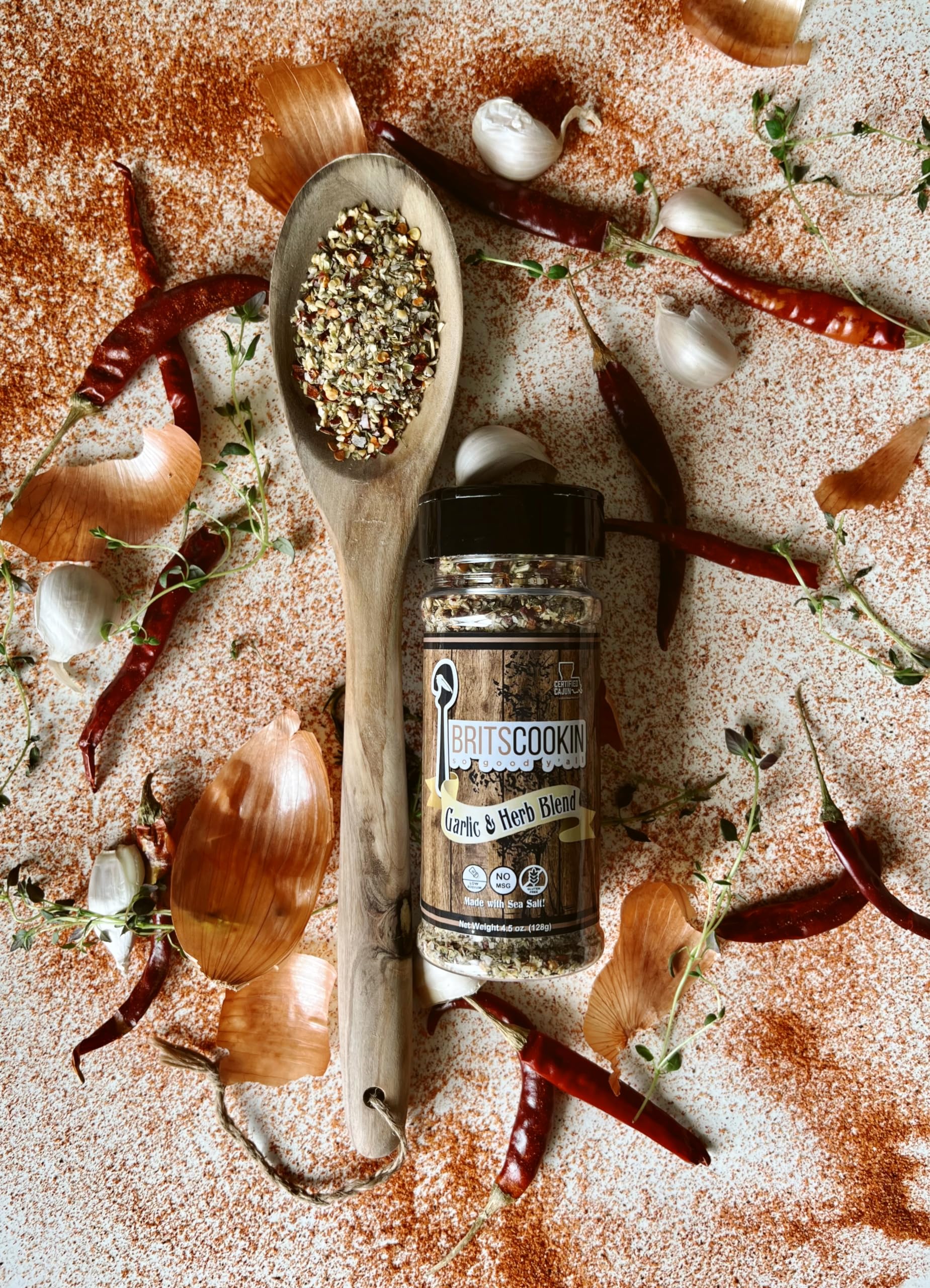 Britscookin jar open with visible garlic and herbs highlighting texture and aroma