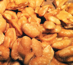 Brittle Brothers open 16 oz box revealing chunky peanut brittle pieces