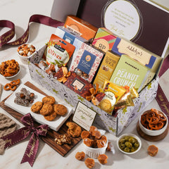 Broadway Basketeers open box overview displaying assorted kosher treats for easy sharing at gatherings