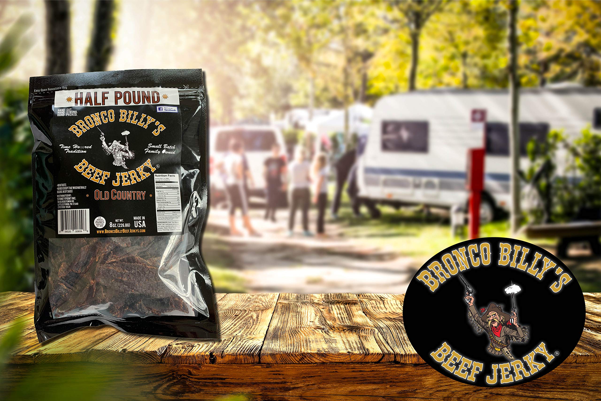 Bronco Billy's jerky strip in hand demonstrating portion size and protein benefit