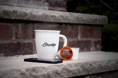 Brooklyn Beans brewed cup with cinnamon garnish highlighting warm, cozy aroma