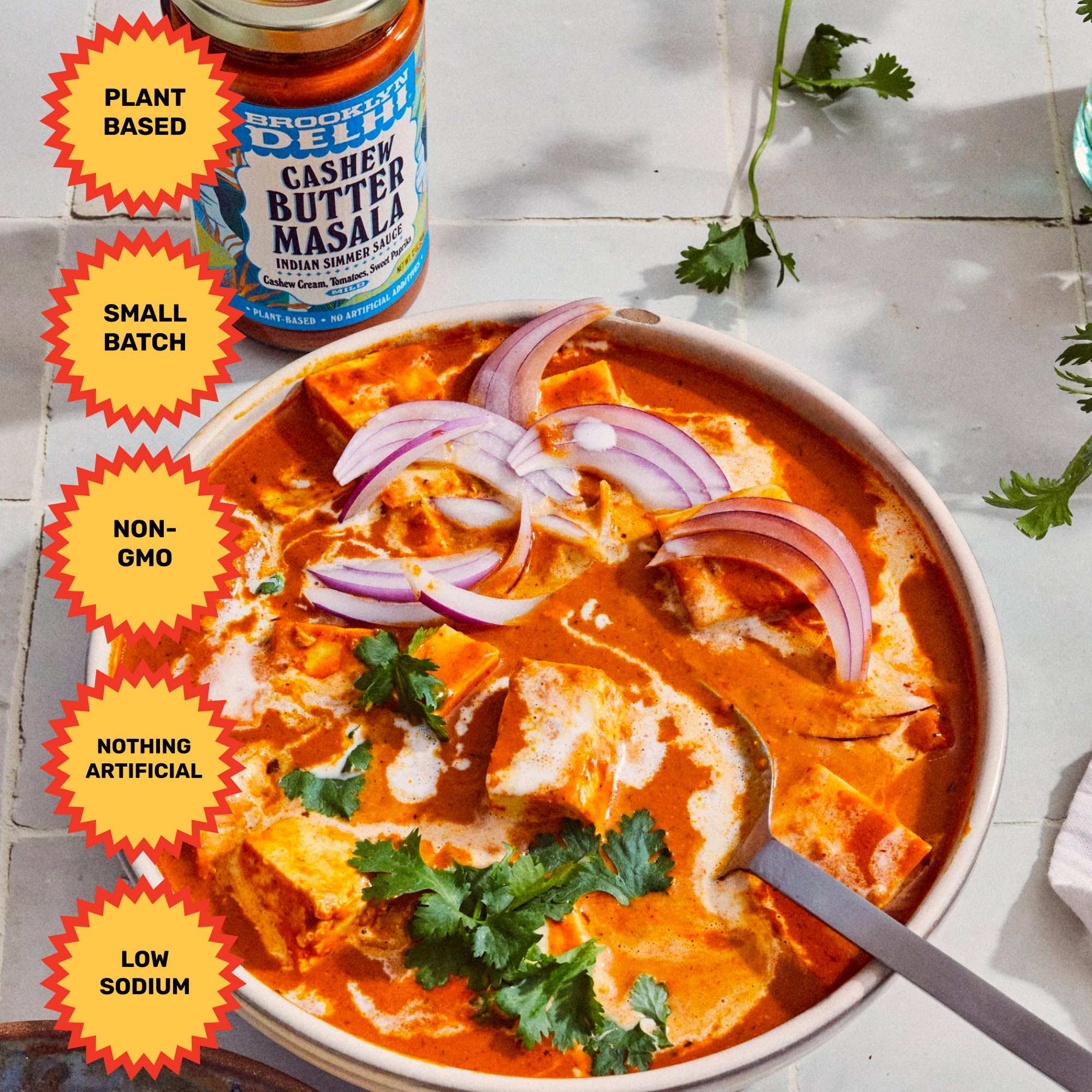 Brooklyn Delhi sauce served with naan and rice showing family-friendly meal idea