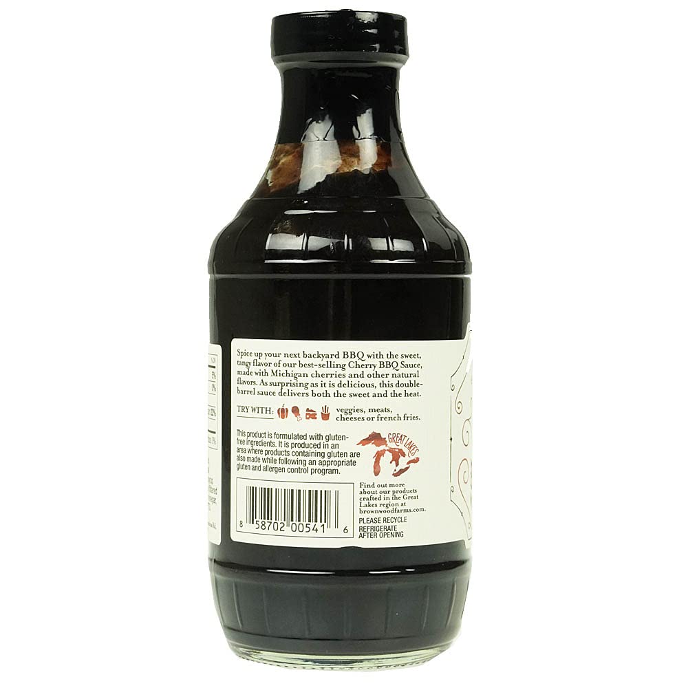 Brownwood Farms bottle in hand showing 20 oz scale for portioning