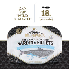 Close-up of Brunswick butterflied boneless sardine fillets in water, highlighting texture and easy use