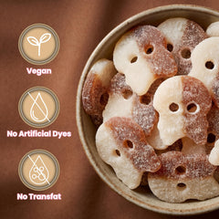 Bubs sour cola skulls arranged on a candy board by Try New Treats adds texture contrast benefit