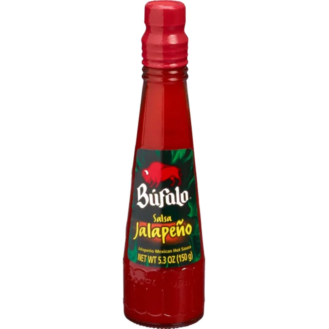 Bufalo salsa poured on taco illustrating easy application and flavor boost