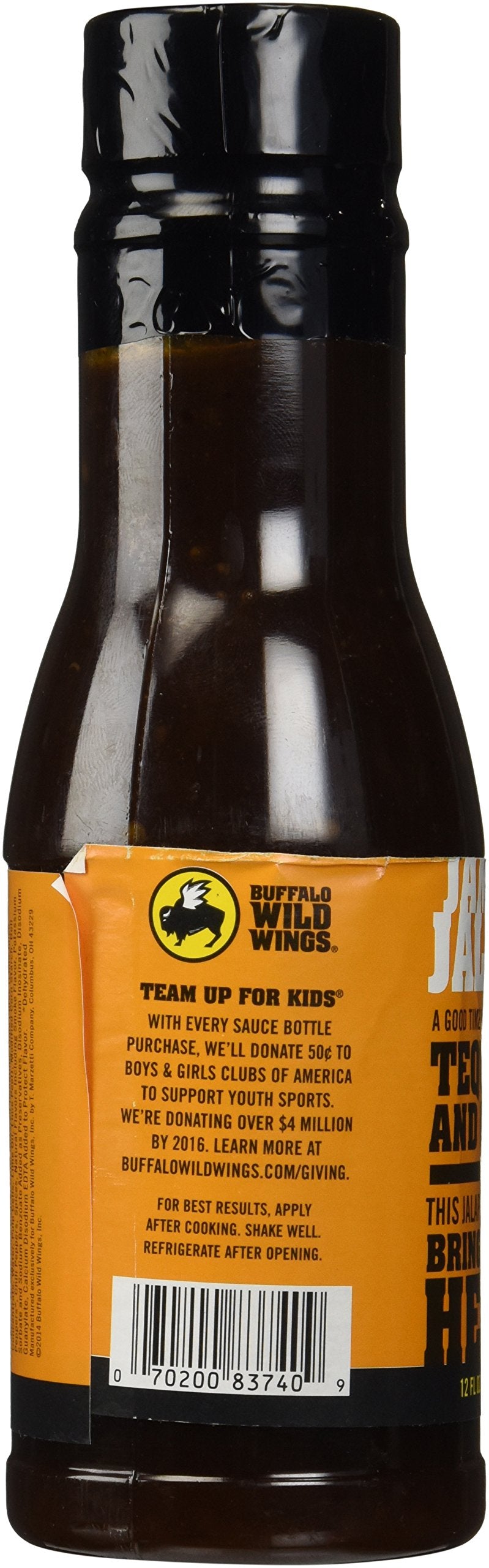 Buffalo Wild Wings sauce pouring onto wings for glossy sweet-heat coating benefit