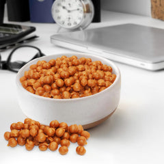 Buha Sweets caramel bits used to drizzle and decorate a plated dessert
