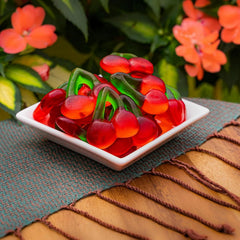 Buha Sweets bowl display of red cherry gummies adding color and instant party appeal