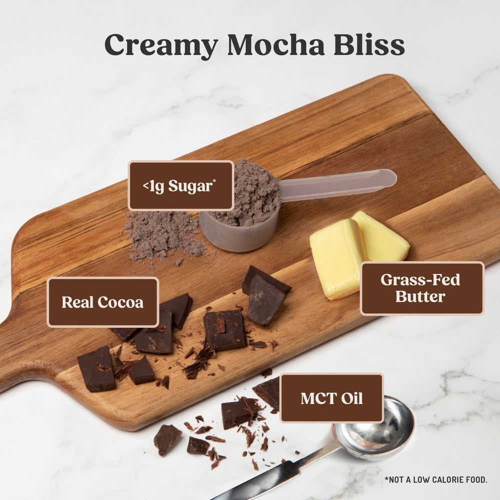 Bulletproof creamer stirred into a mug of coffee shows creamy mocha result and enhanced flavor