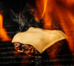 BUNKHOUSE seasoning forming peppery bark on grilled steak for flavor impact