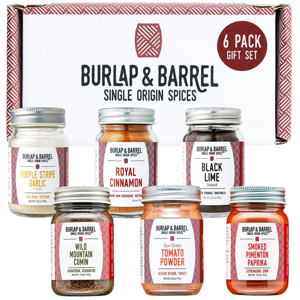 Burlap & Barrel full gift box front view showing six spice jars and gift-ready packaging benefit: easy gifting