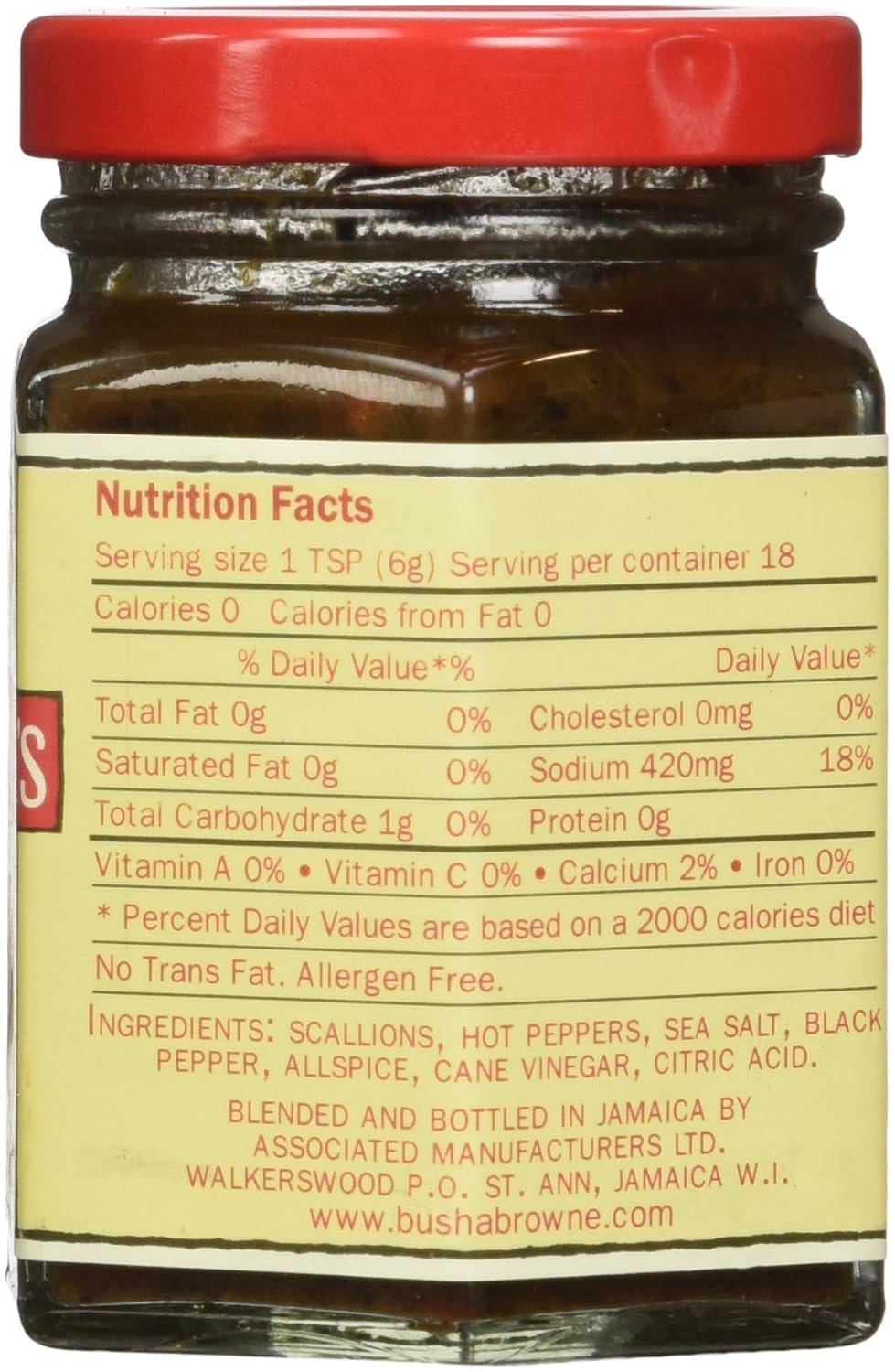 Busha Browne rub applied to grilled chicken for bold Jamaican flavor