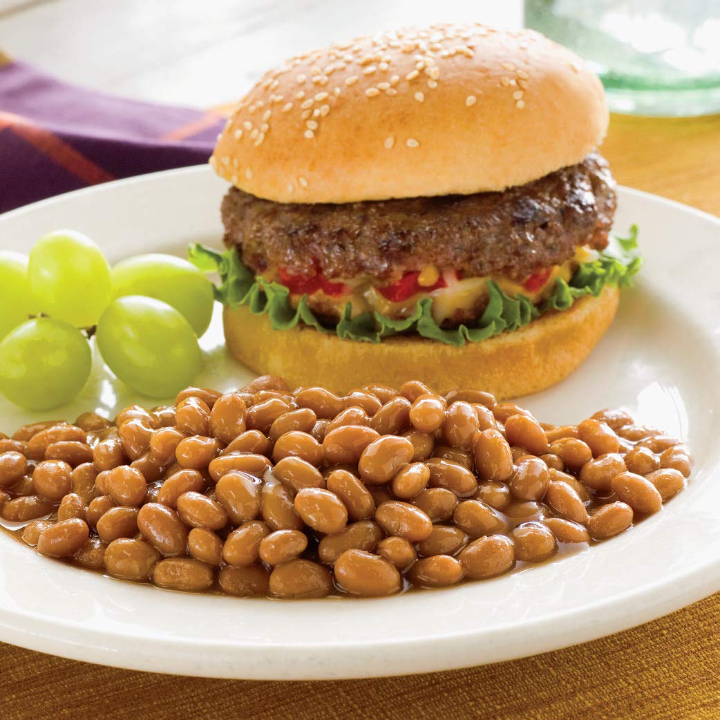 Close-up of Bush's Best beans texture showing tender navy beans and savory sauce
