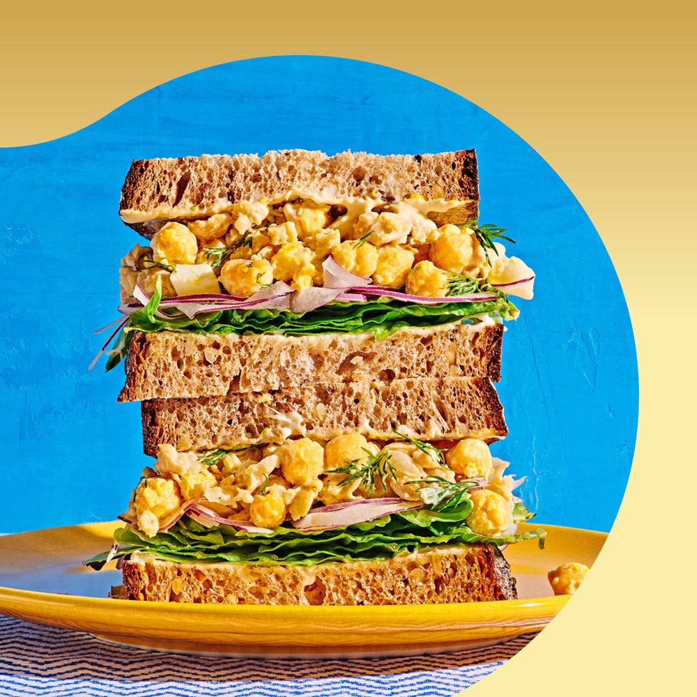 Bush's Best garbanzo beans mixed in salad providing protein and fiber