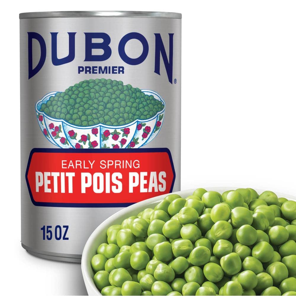 Bush's Dubon Premier can held in hand for scale, showing pack size and grab-and-go convenience