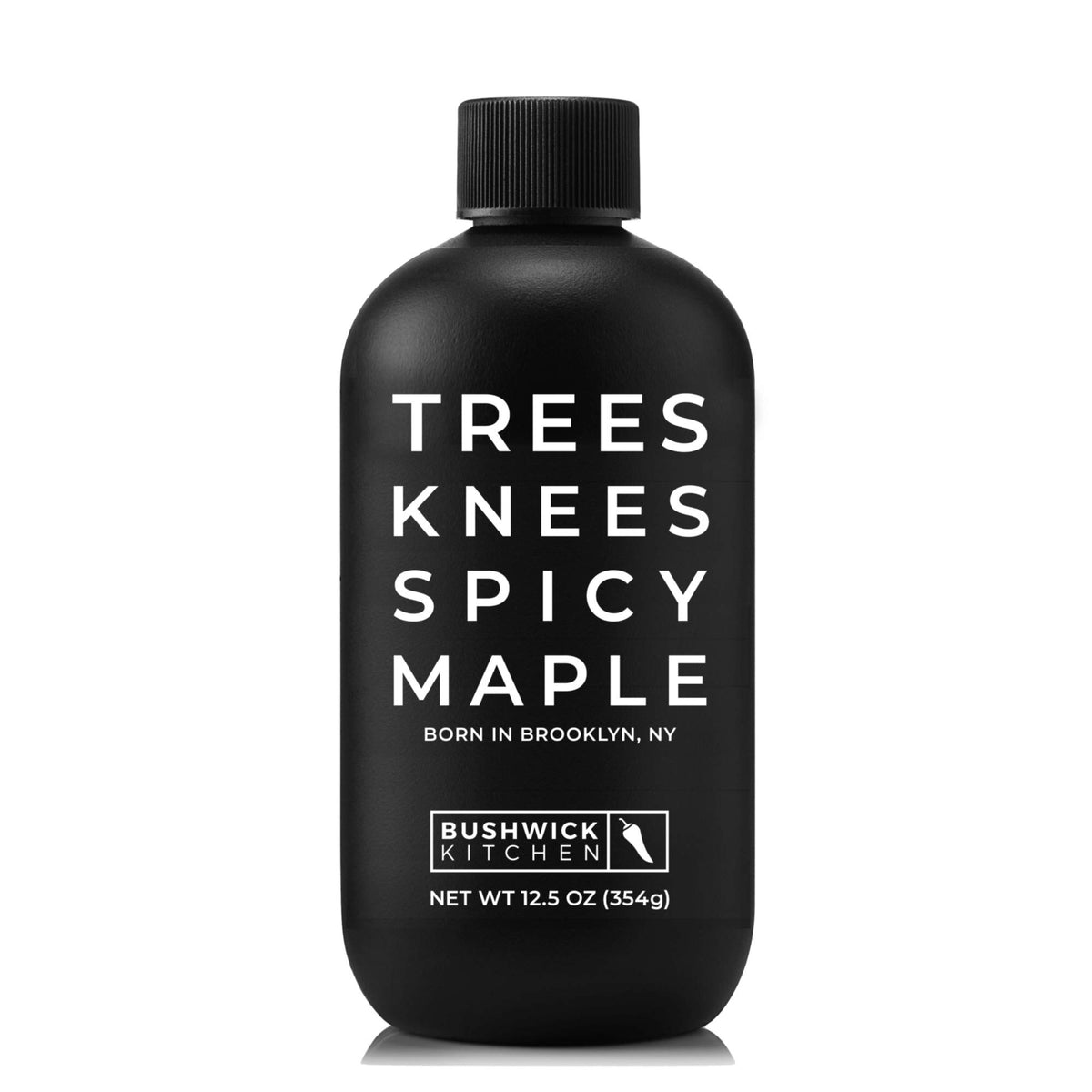 Bushwick Kitchen front bottle displaying organic spicy maple syrup benefit: bold flavor