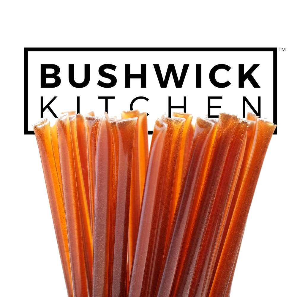 Bushwick Kitchen honey straw beside a coin showing size and portion control