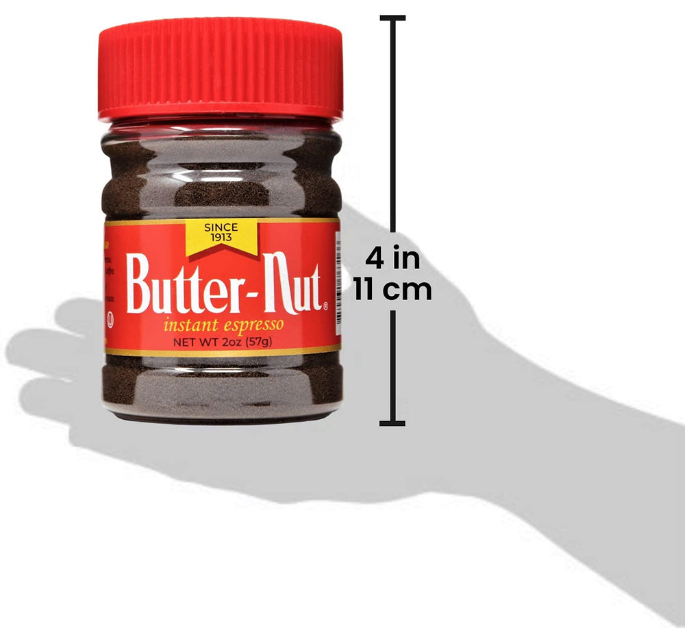 Butter-Nut packets next to a measuring spoon showing compact size and portability