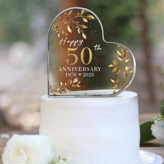 BUZCOZY topper placed on anniversary cake enhancing presentation and focal point