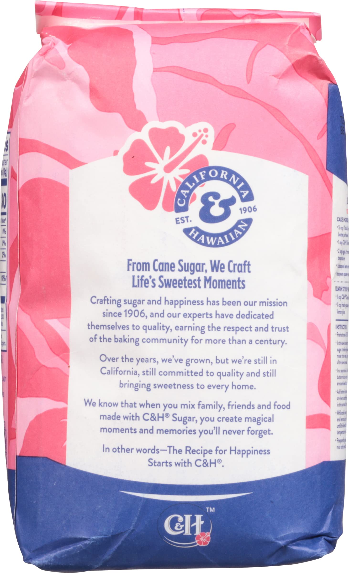 C&H two 4 lb bags beside measuring cup demonstrating quantity