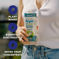 Glass poured with C2O coconut water showing clear, refreshing pour