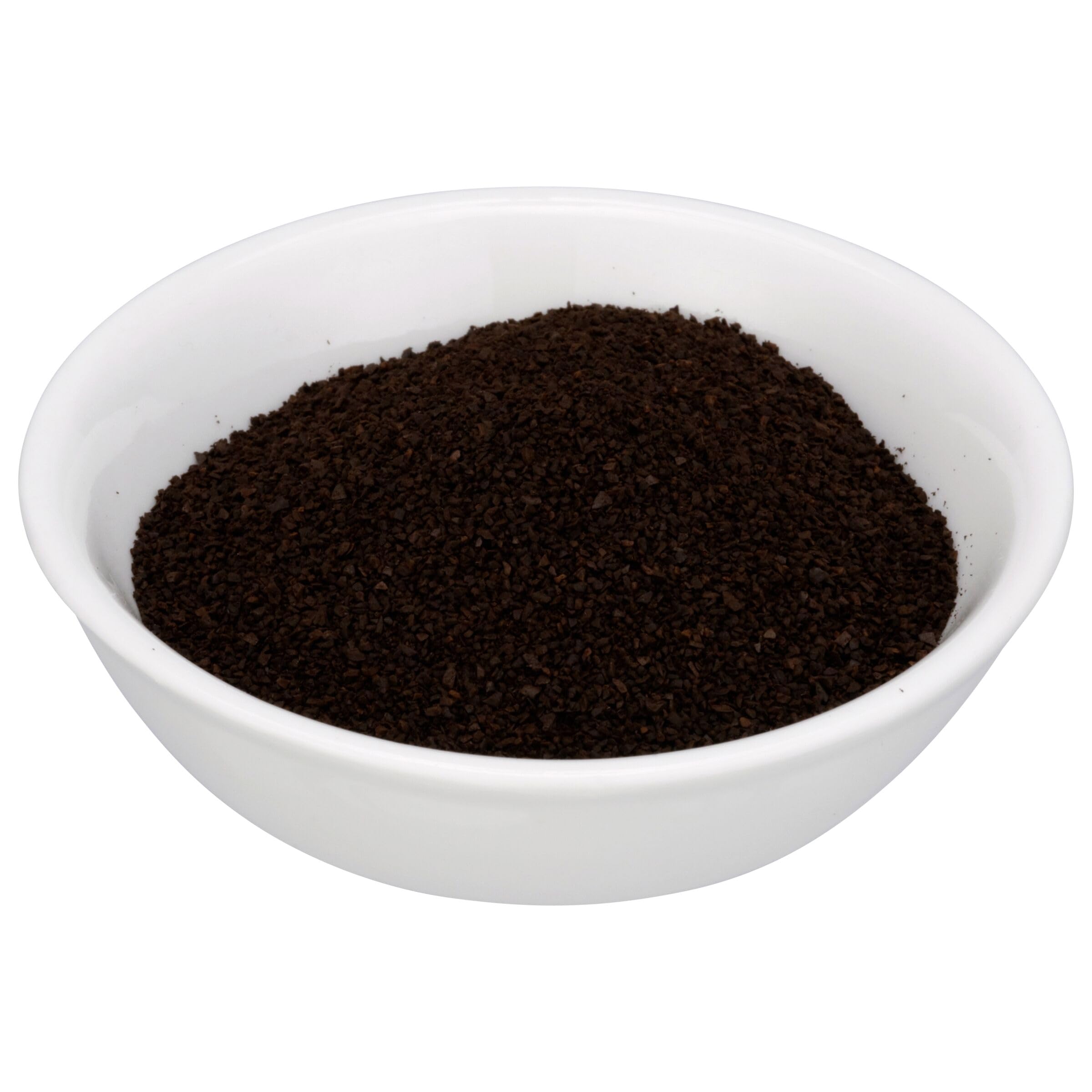 Café Bustelo close-up of ground coffee texture highlighting rich roast aroma