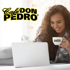 Cafe Don Pedro can opened with scoop highlighting convenient portioning