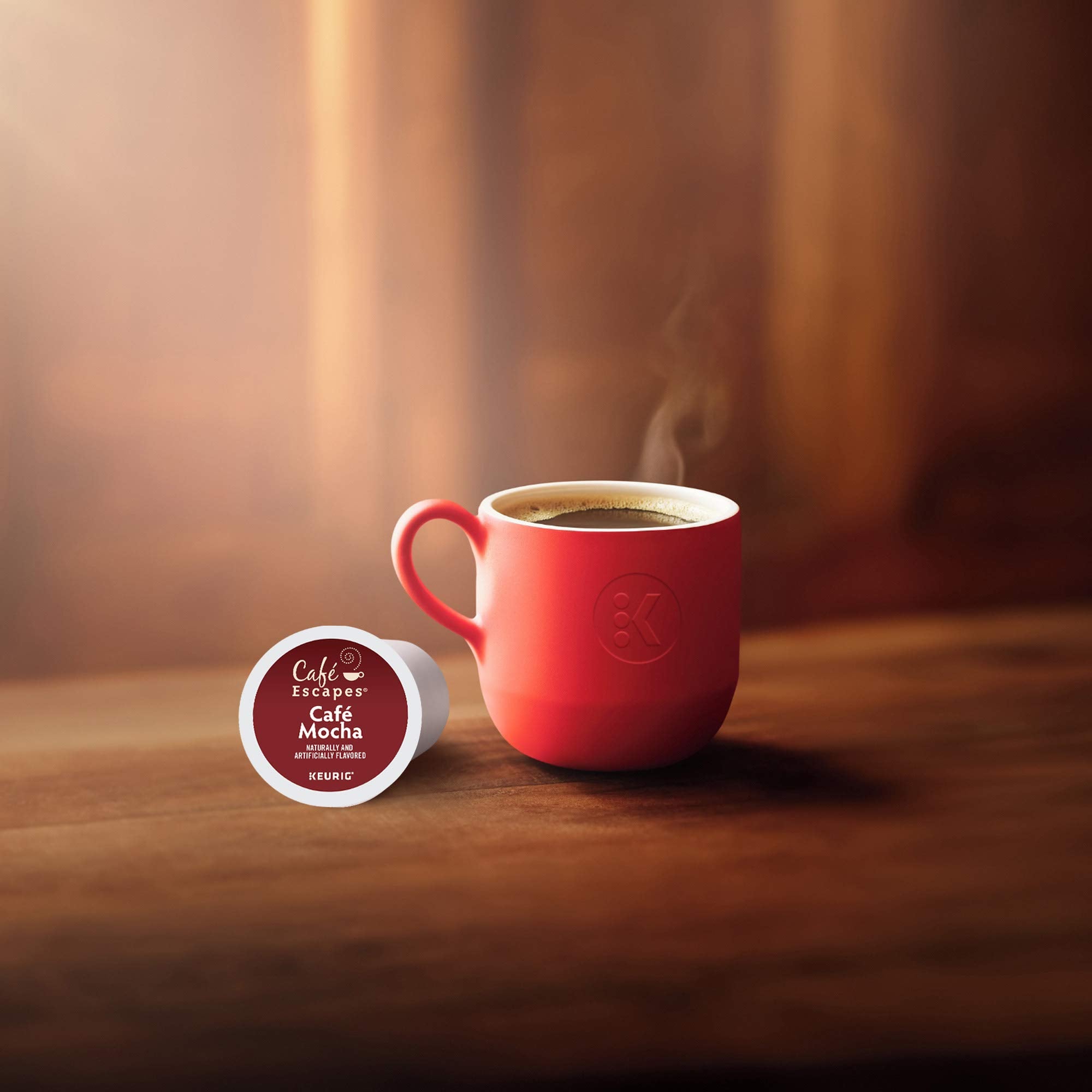 Café Escapes bundle next to a ruler and coffee cup displaying pod quantity and scale