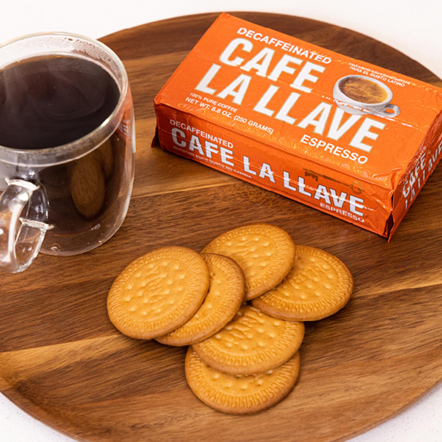 Cafe La Llave lifestyle kitchen cup beside bricks illustrating home use and cafe-style experience benefit