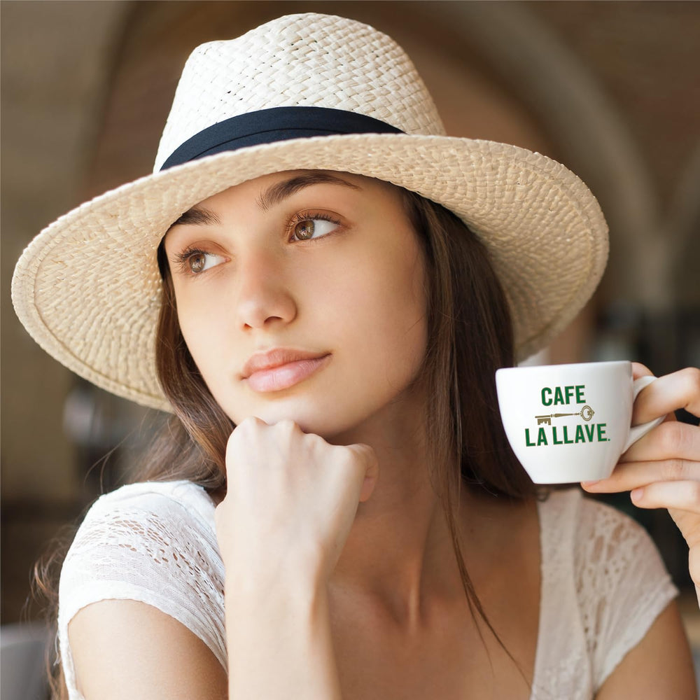 Café La Llave pod inserted in a Nespresso Original Line machine for convenient brewing