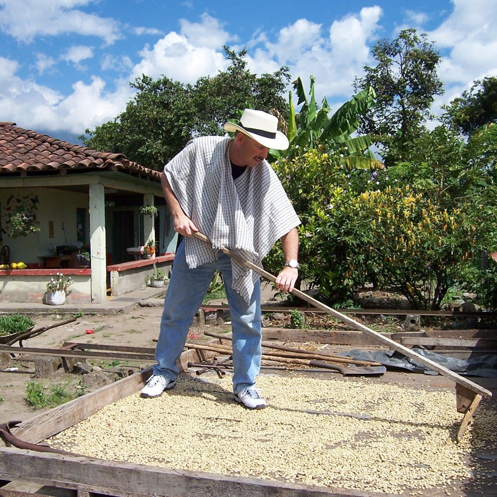 Cafe Don Pablo bag held in hand showing 2lb scale and value for home use