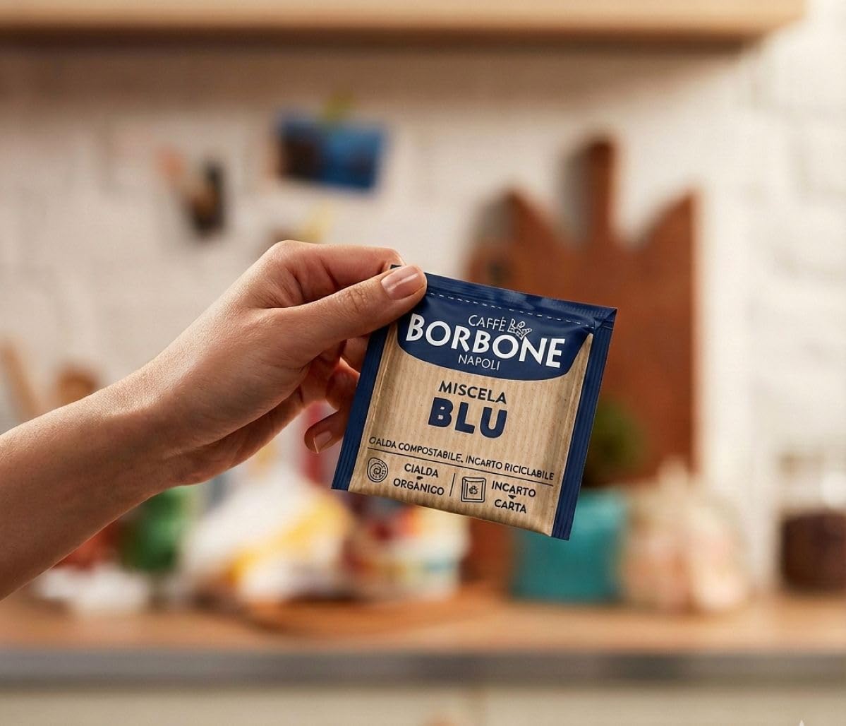 Caffè Borbone espresso cup in kitchen setting showcasing ready-to-drink convenience