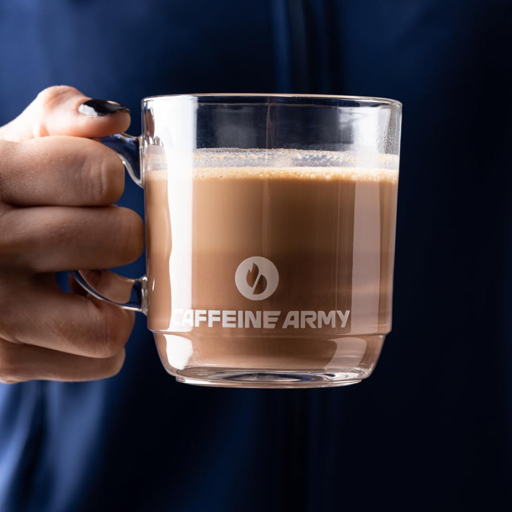 CAFFEINE ARMY ChocoVanilla on a desk beside laptop to show productive energy
