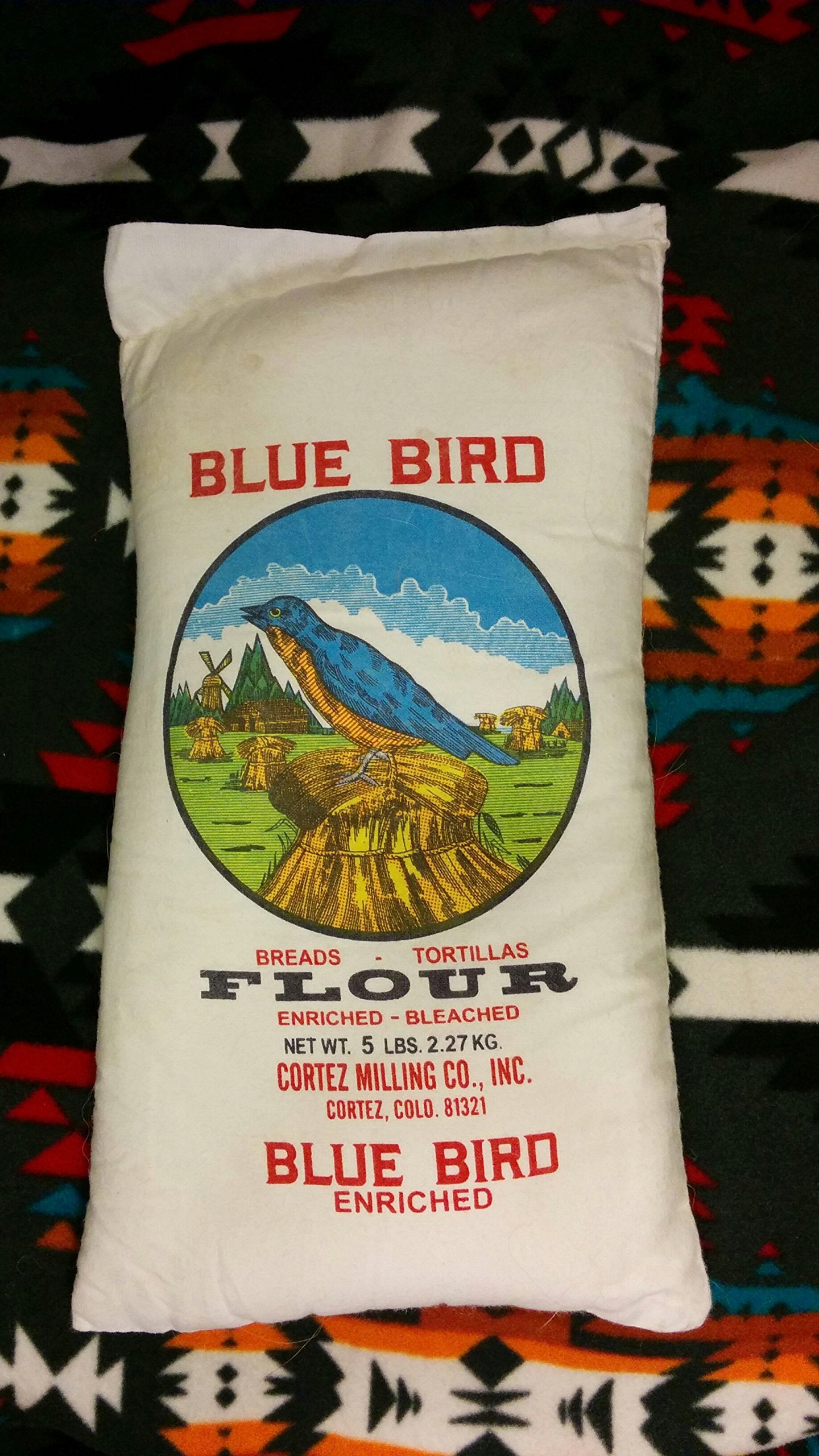 CAIKEZI Blue Bird Flour front cotton bag showing brand and eco-friendly packaging benefit
