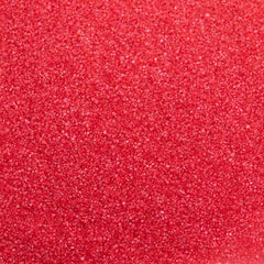 Cake Mate sanding sugar applied on cupcakes adding bold color and sparkle