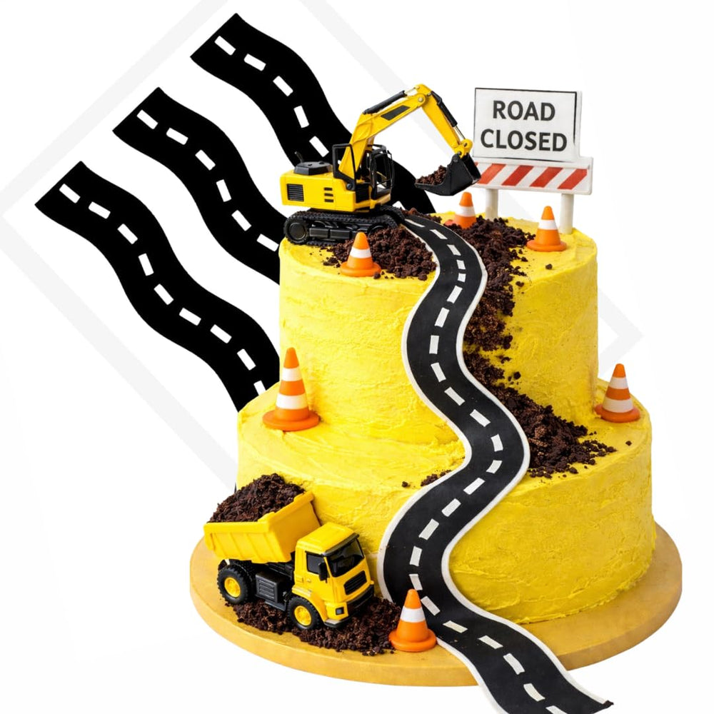 CakeSupplyShop Celebrations strip applied to a round cake adding instant raceway theme