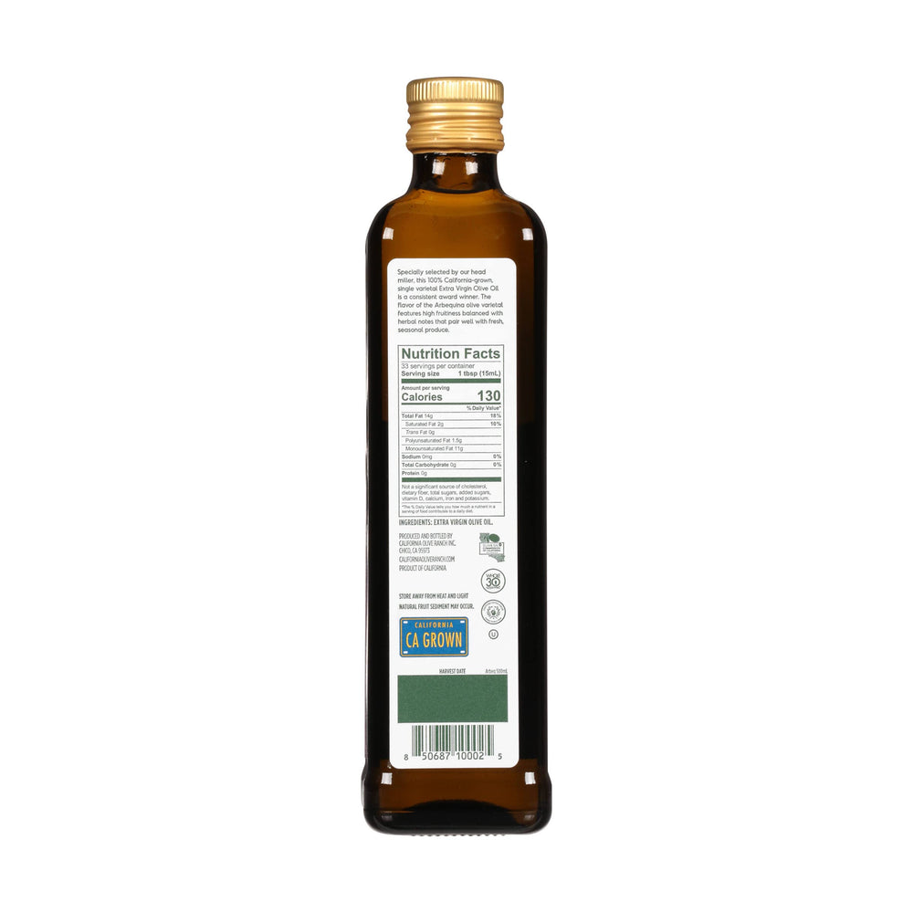 California Olive Ranch bottle next to knife showing size and usability