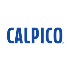 CALPICO mango poured into glass in kitchen showing versatile serving and enjoyment