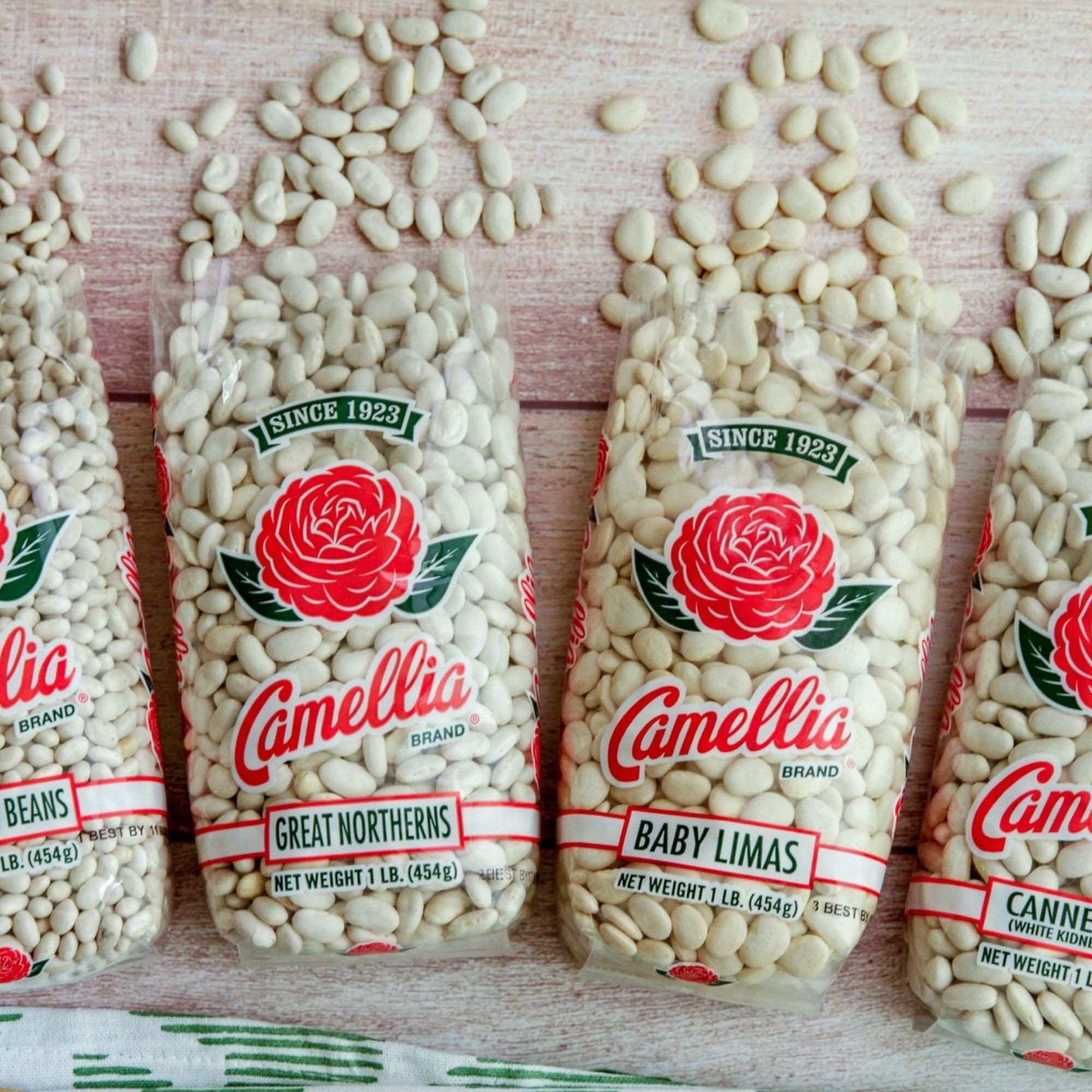 Camellia Brand beans beside measuring cup for clear size and portioning